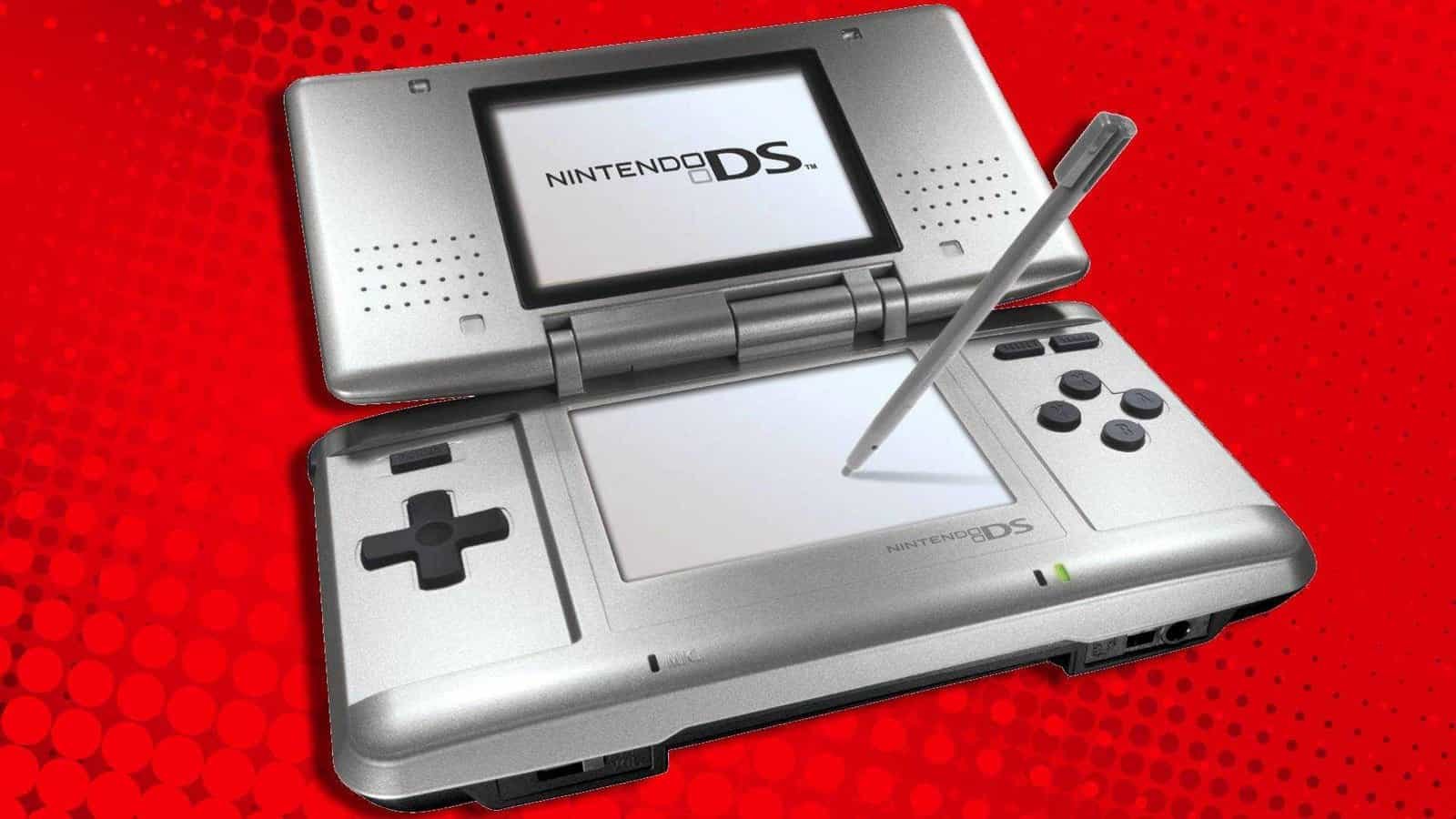 A Nintendo DS and stylus against a red dotted background.