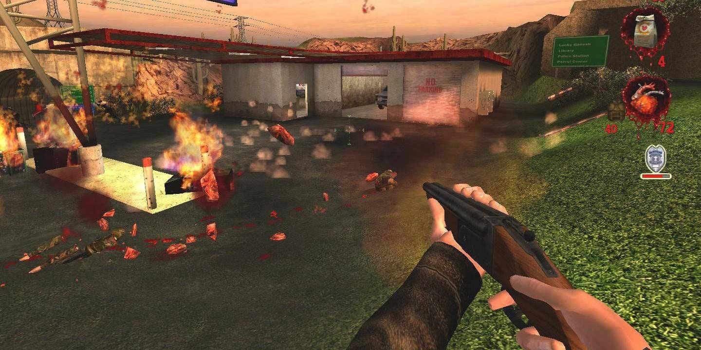 The Postal Dude firing at a gas station on fire in the video game Postal 2