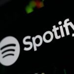 Spotify starts tagging AI artists next month, and the labels have teeth