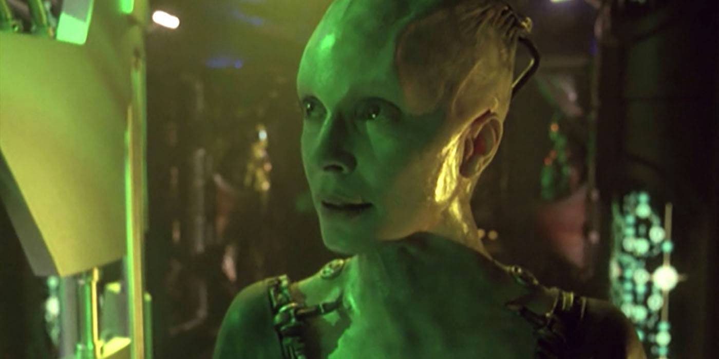 The Borg Queen looking angry on a Borg ship in the Star Trek: Voyager episode