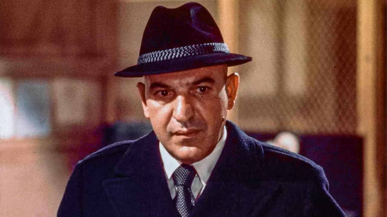 Kojak (Telly Savalas) looking concerned in Kojak.