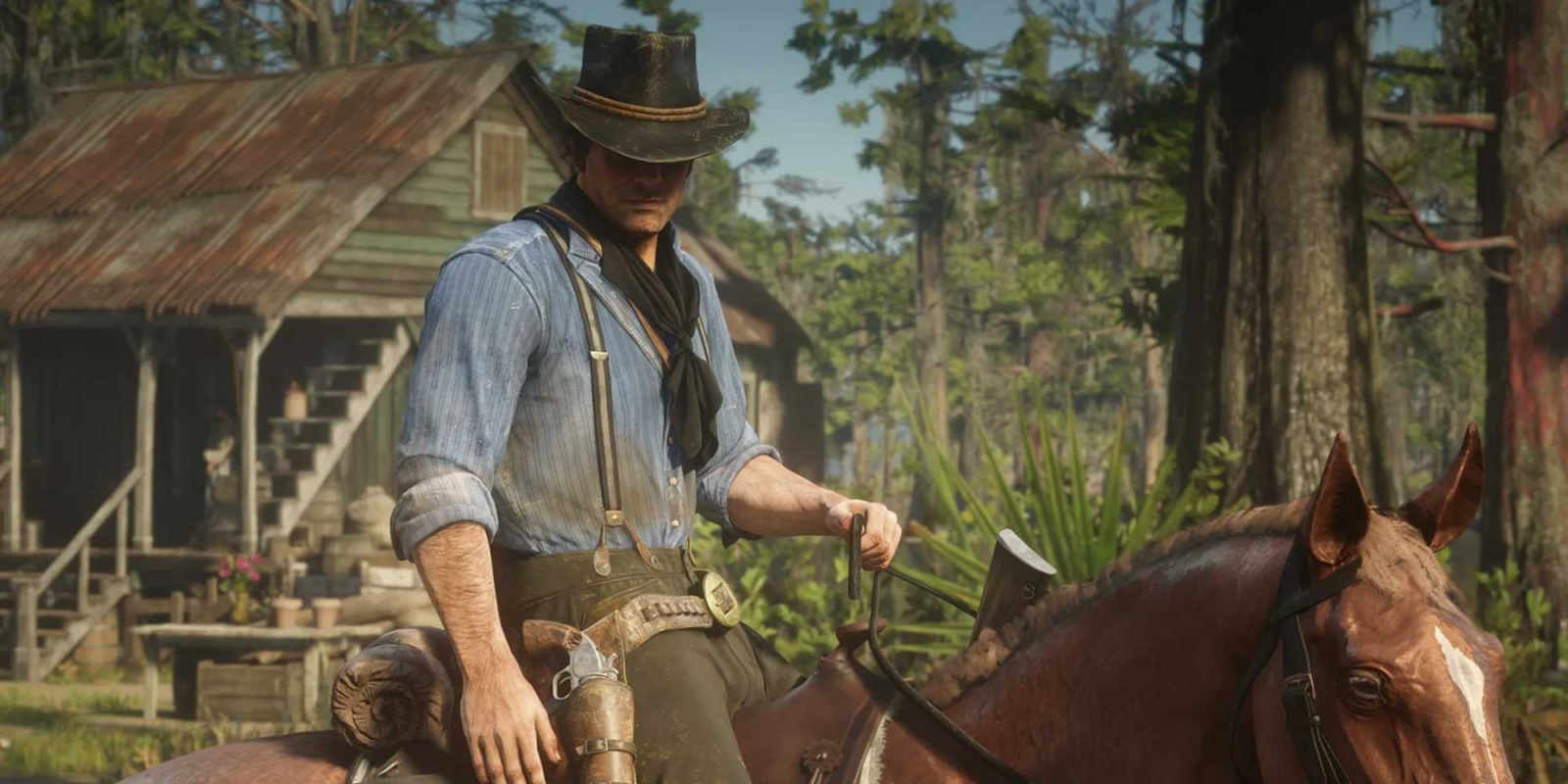 Arthur Morgan rides a horse in Red Dead Redemption 2.