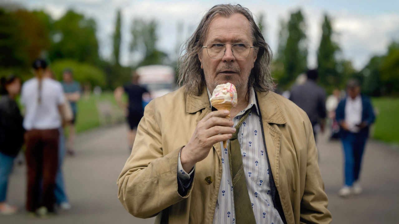 Jackson Lamb (Gary Oldman) licking an ice cream cone in Slow Horses.