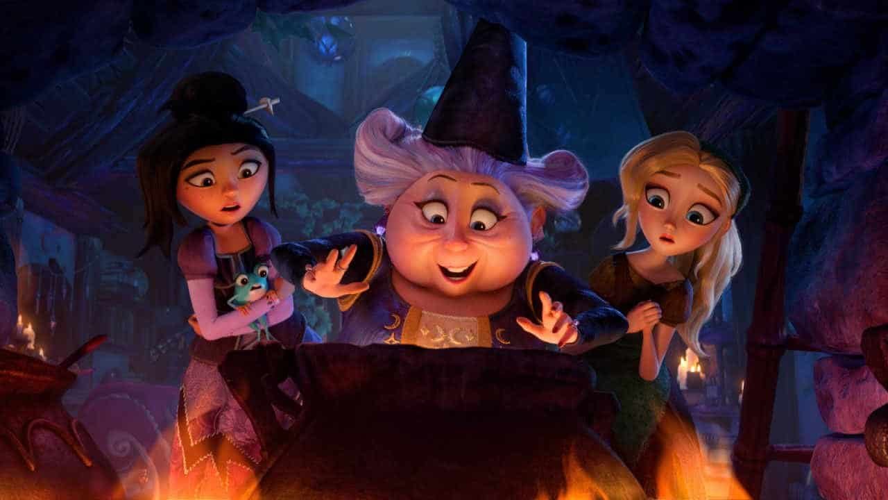 Lilith holds a frog and looks over Fairy Gondmother's shoulders along with Cinderella in Steps
